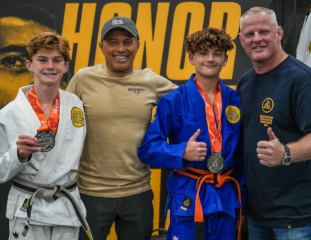 Master Royler and Professor Brian with some of the teen students